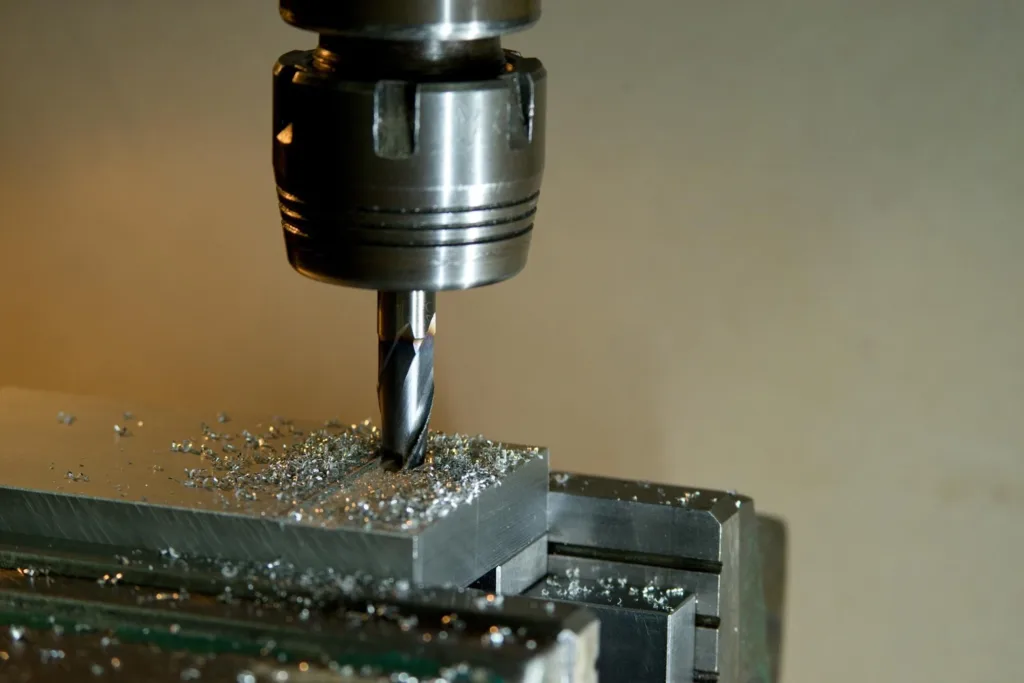 drilling holes into steel flange